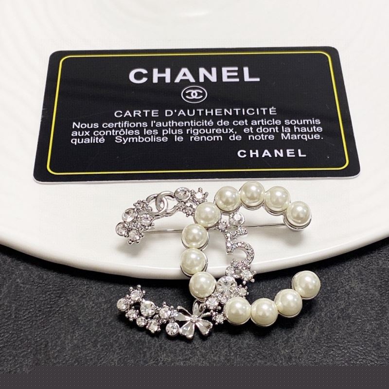Ch*el brooches